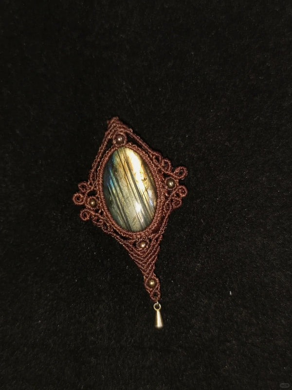 Macrame style knotted labradorite crystal pendant